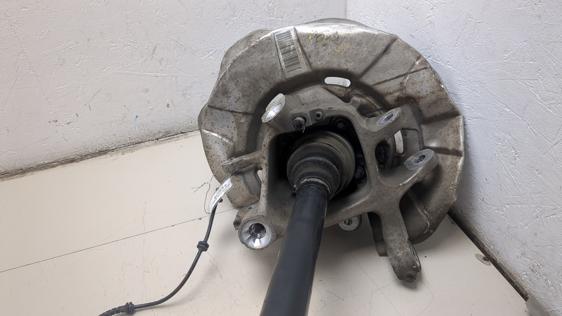 Кулак поворотный задний левый