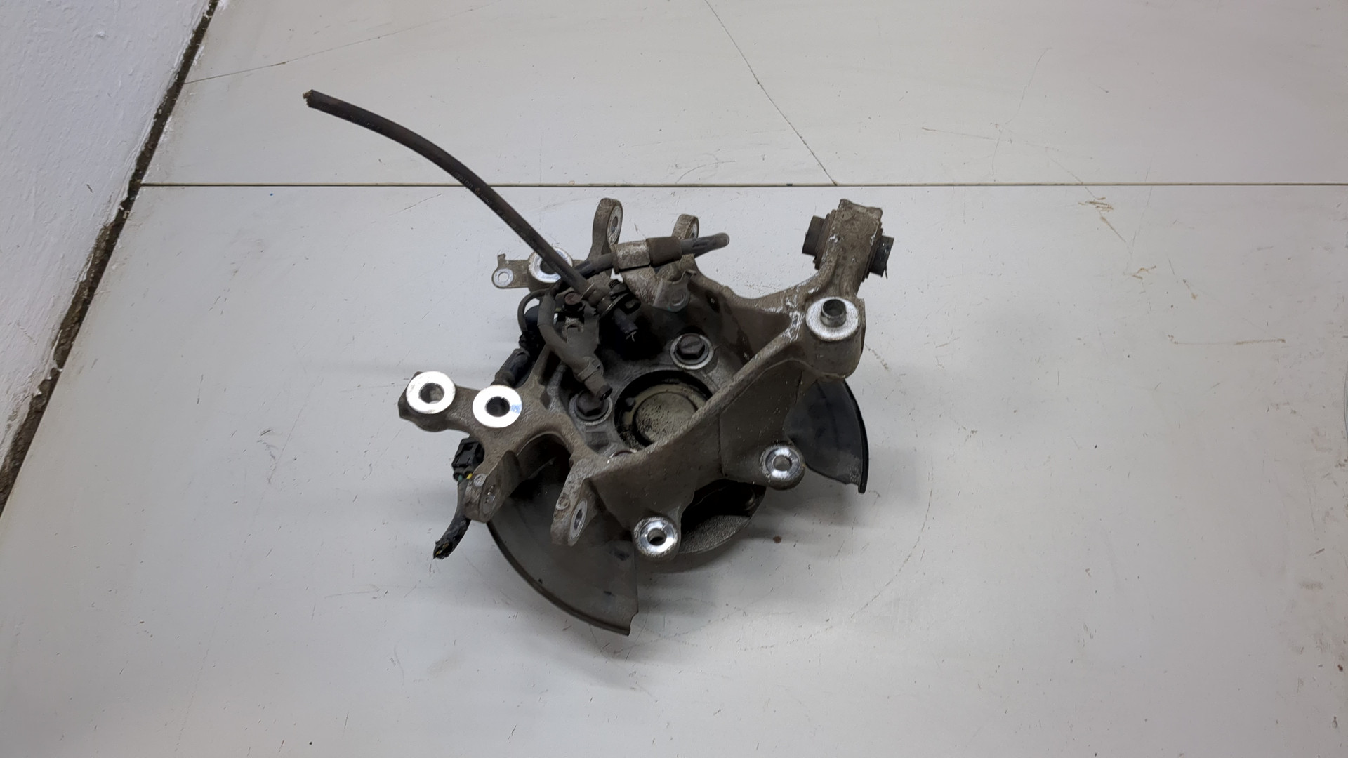 Кулак поворотный задний левый