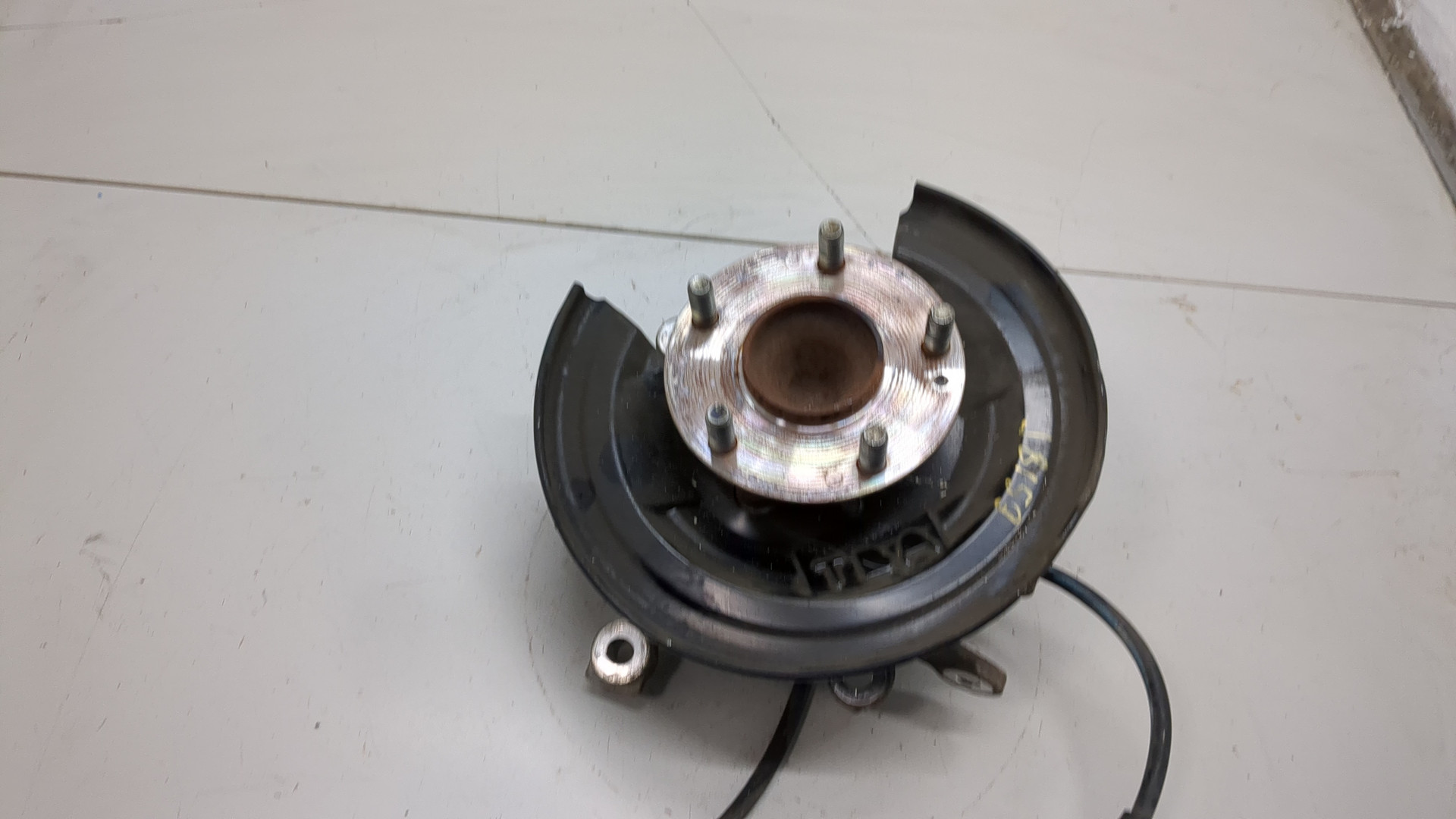 Кулак поворотный задний левый