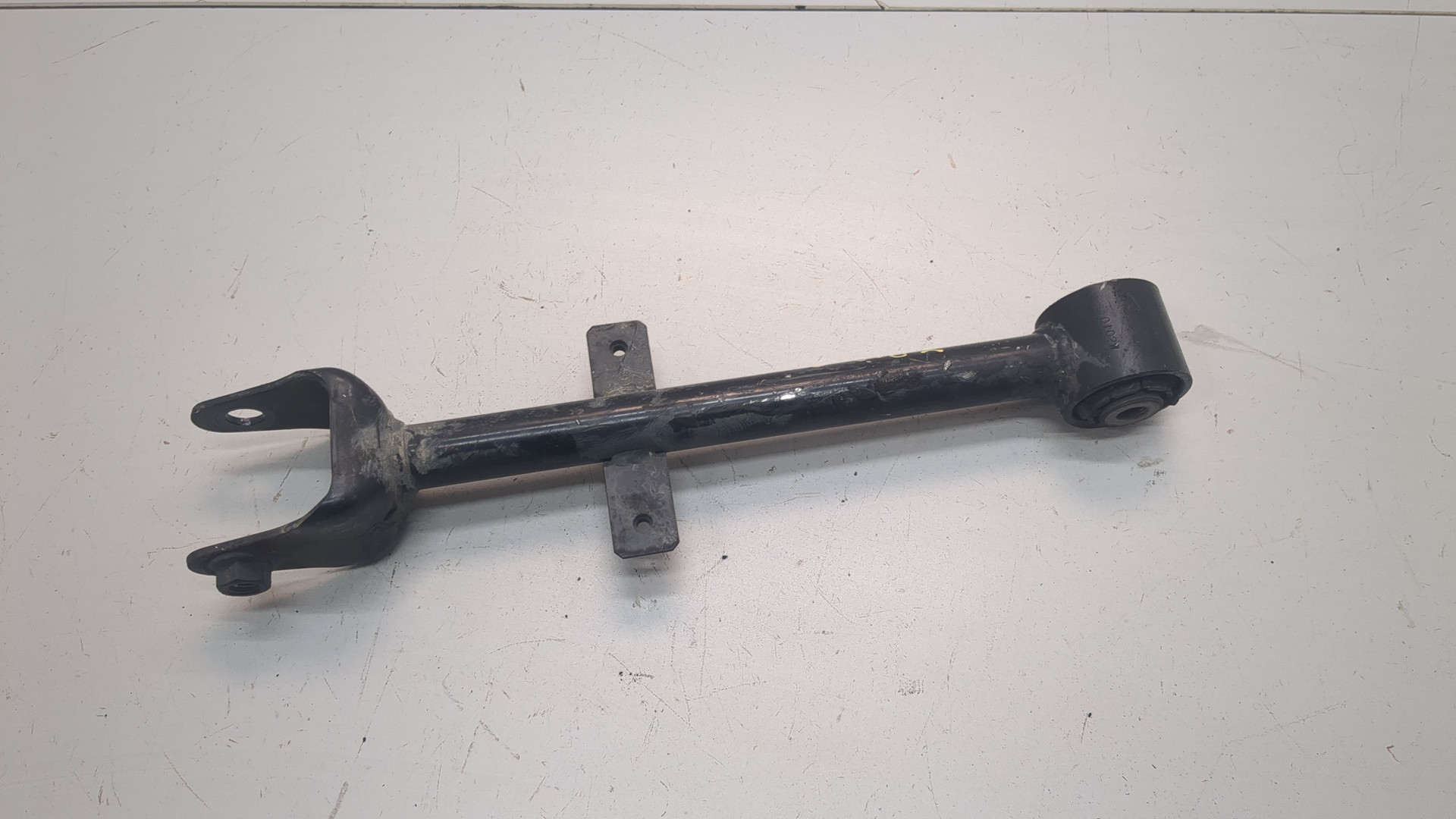 Рычаг задний