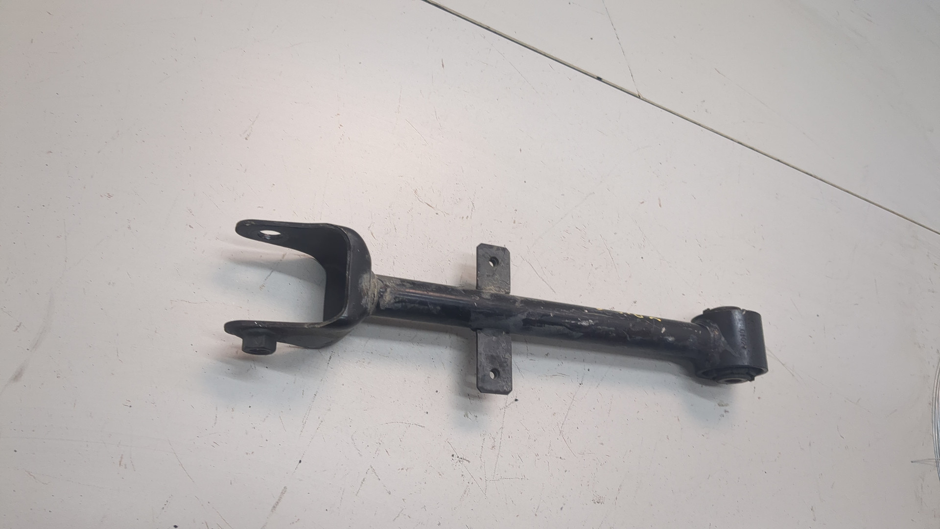 Рычаг задний