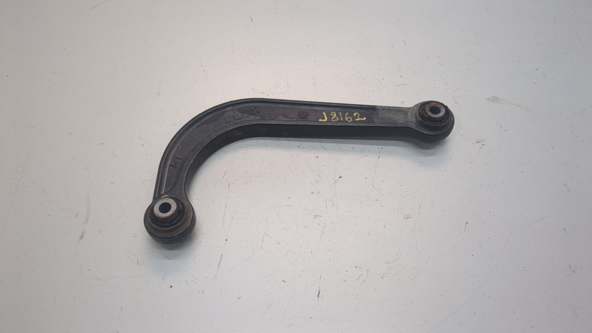 Рычаг задний