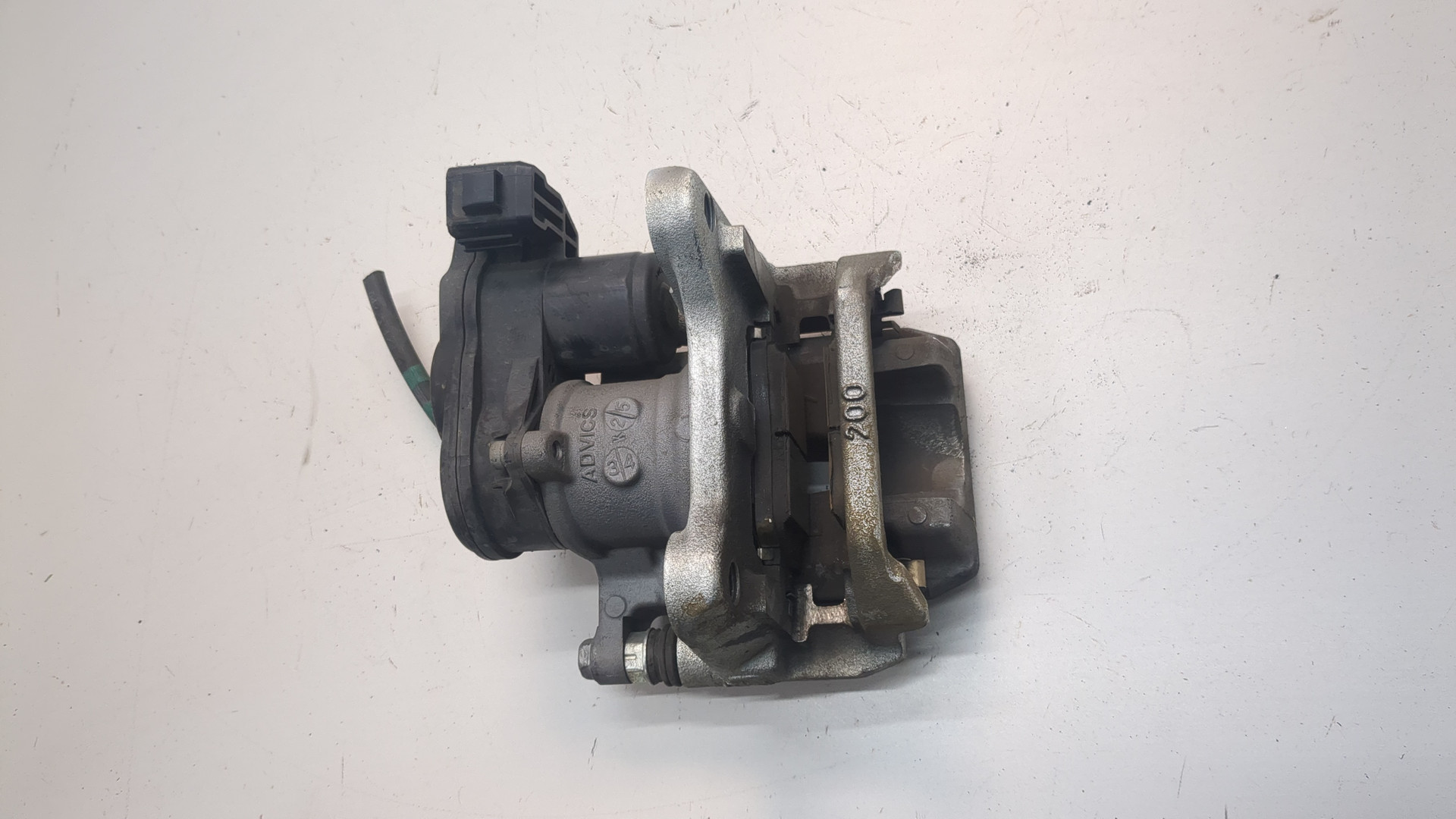 Суппорт задний левый