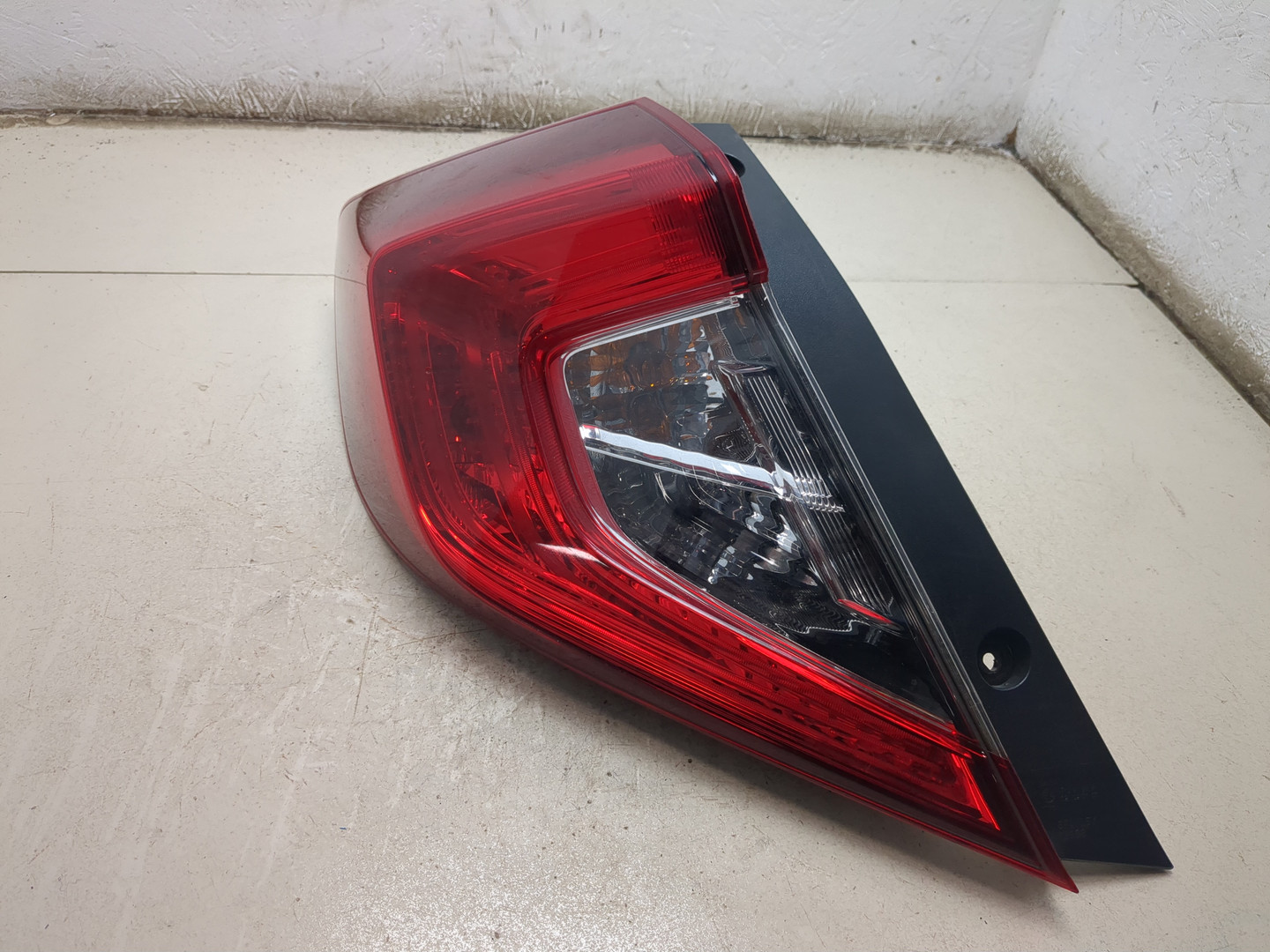 Фонарь задний левый