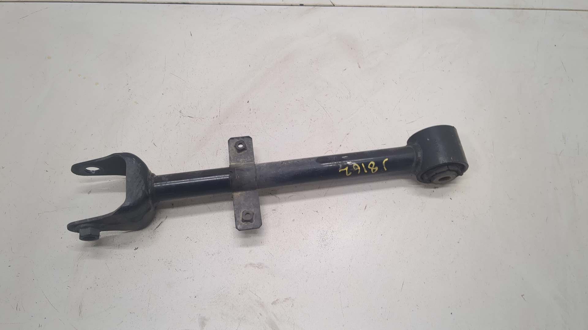 Рычаг задний