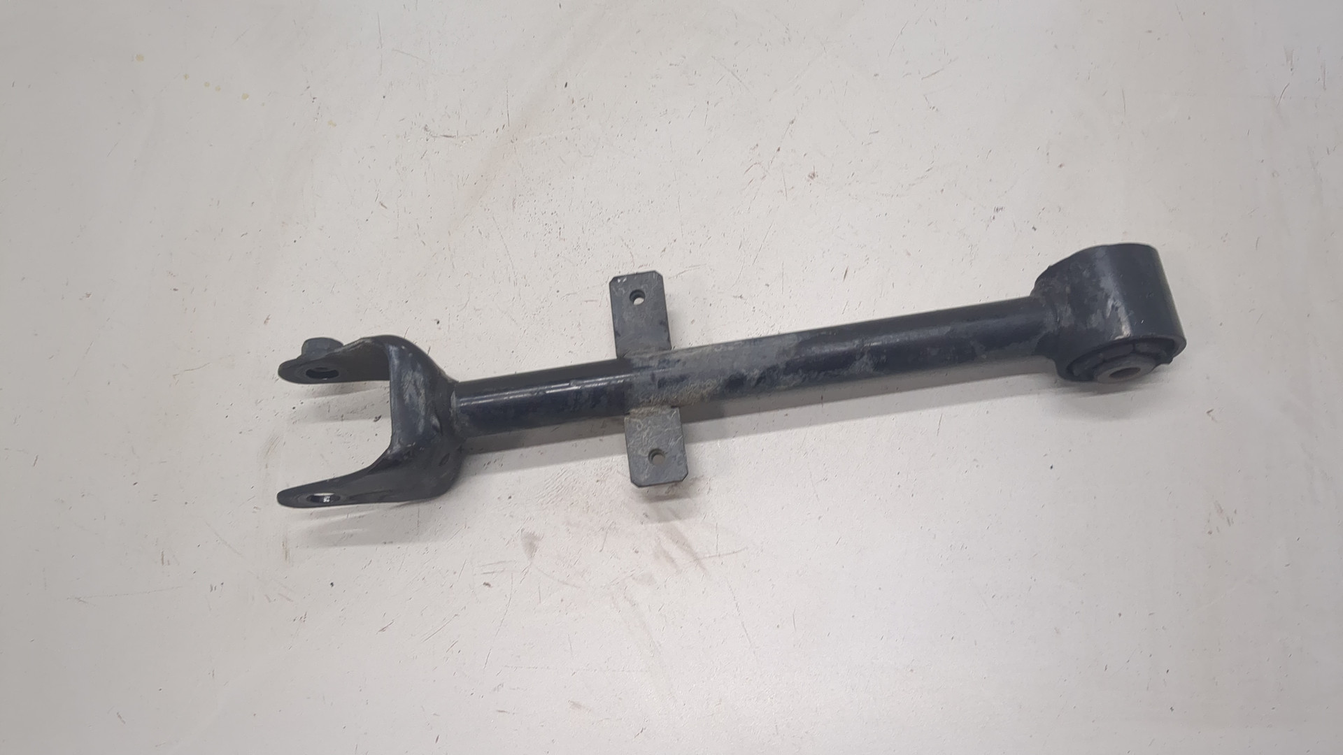 Рычаг задний