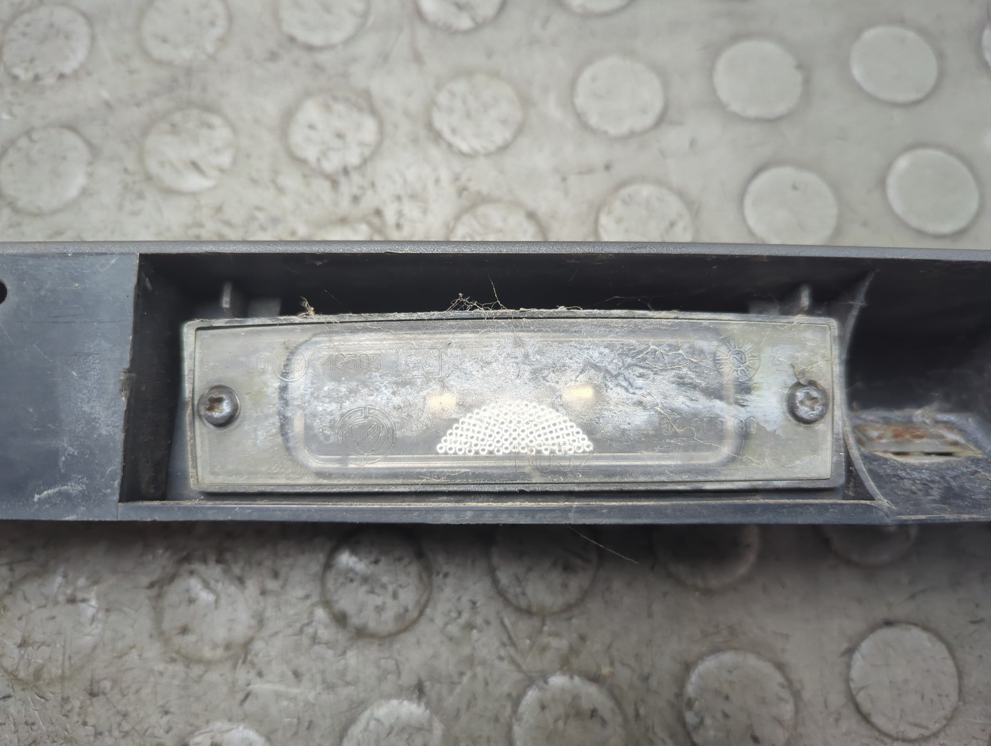 Фонарь подсветки номера