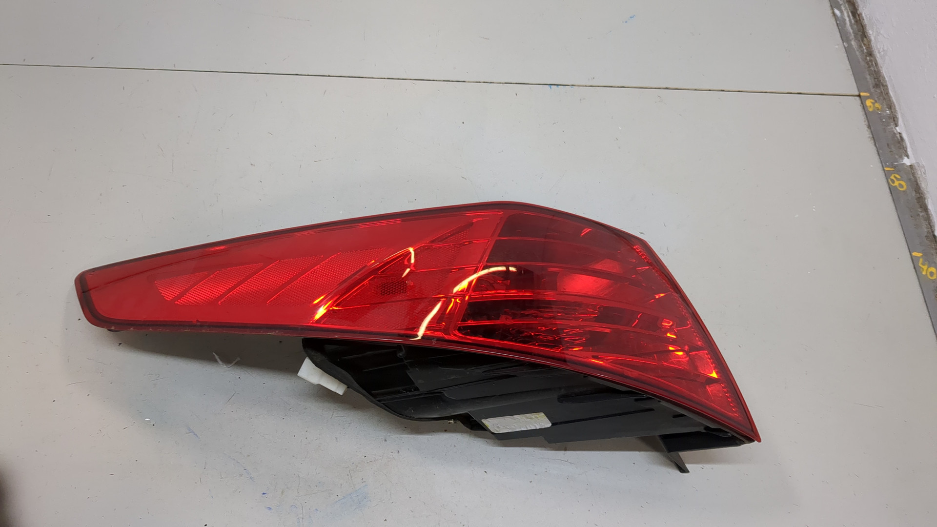 Фонарь задний левый