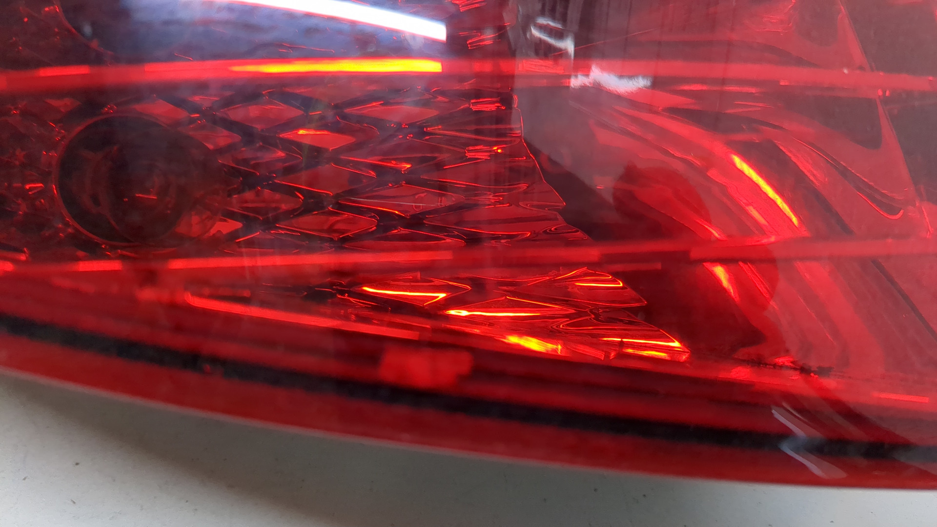 Фонарь задний левый