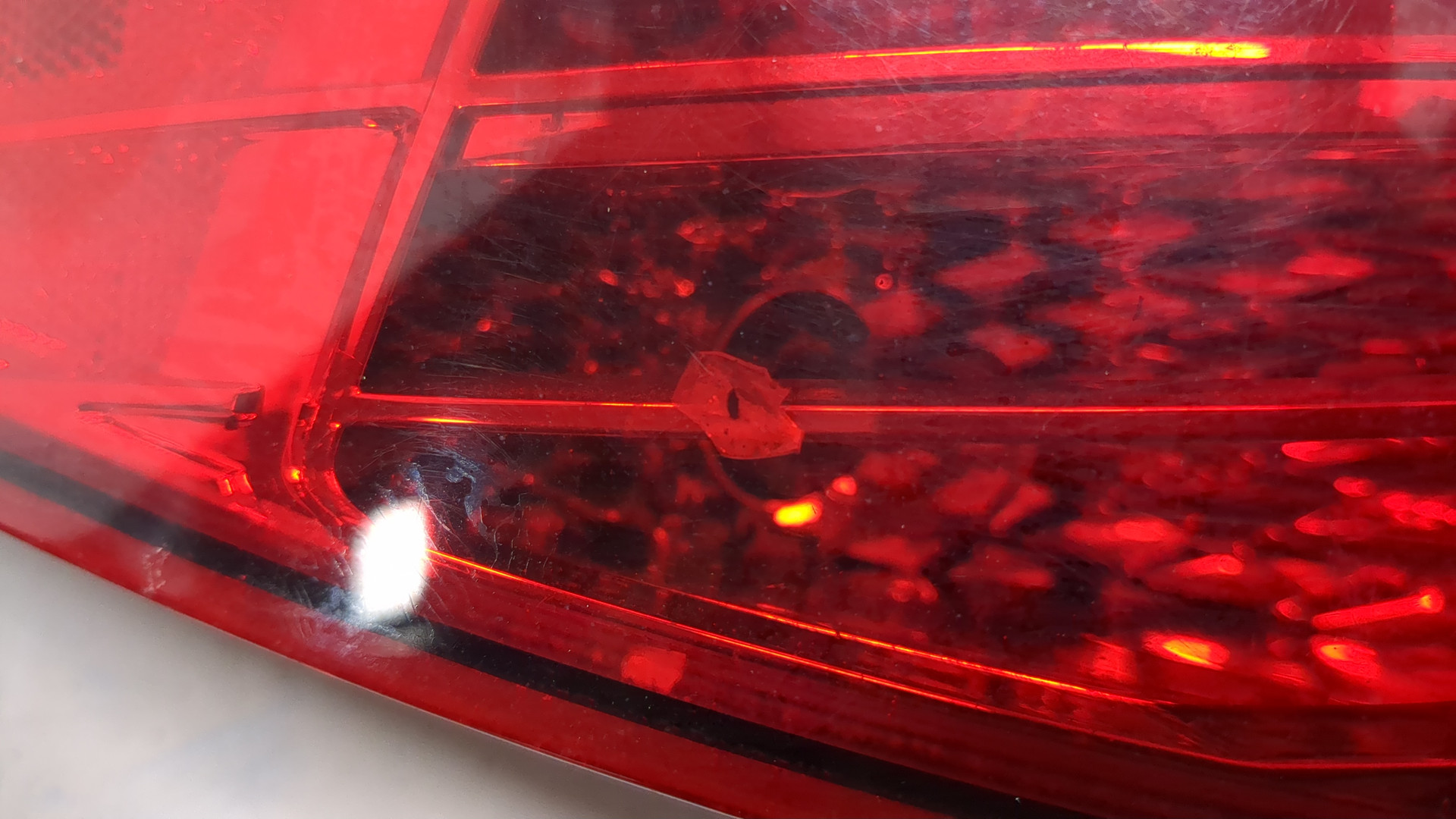 Фонарь задний левый