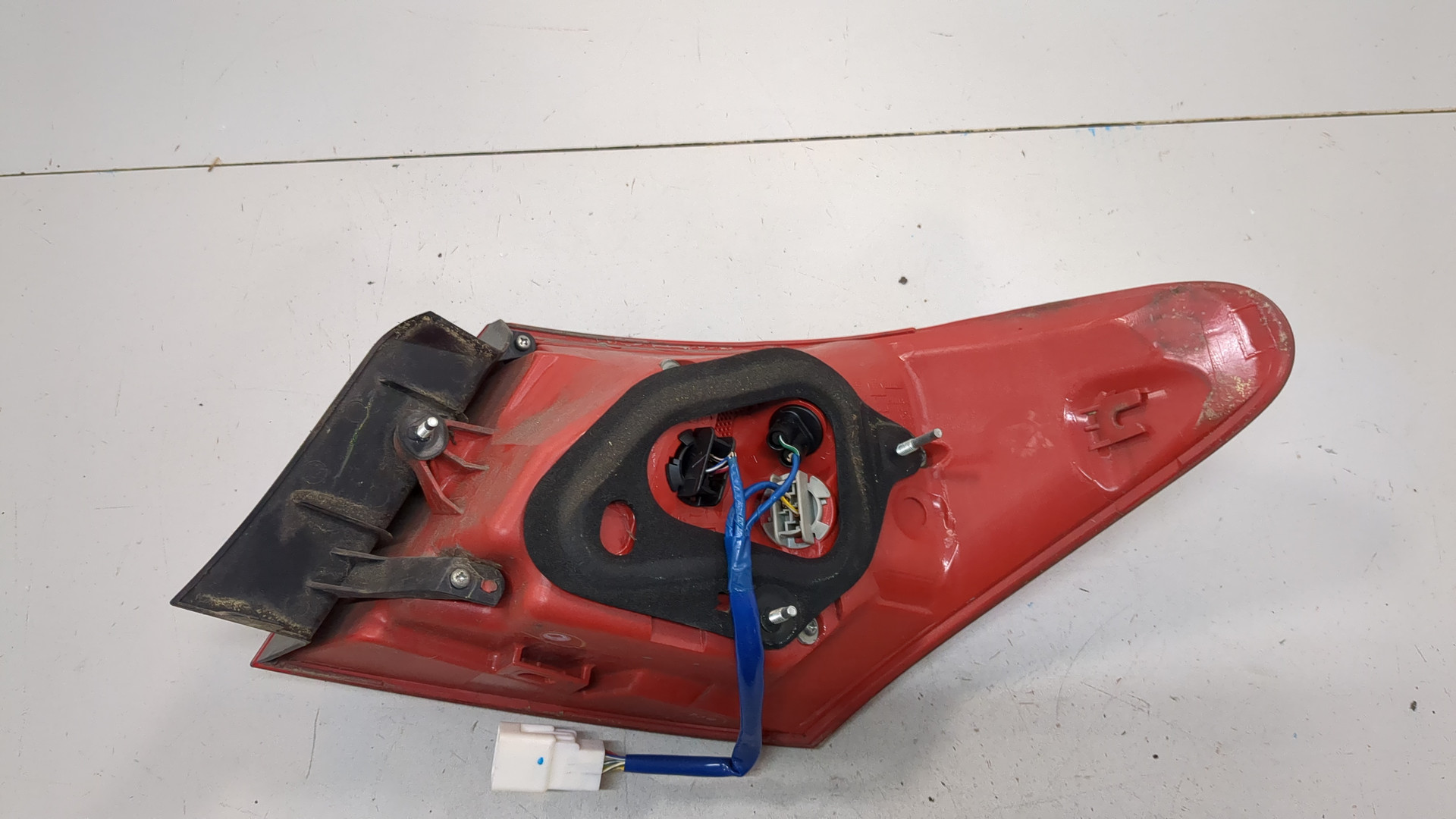 Фонарь задний левый