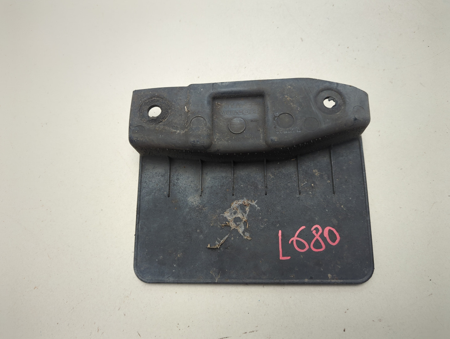 Брызговик задний левый