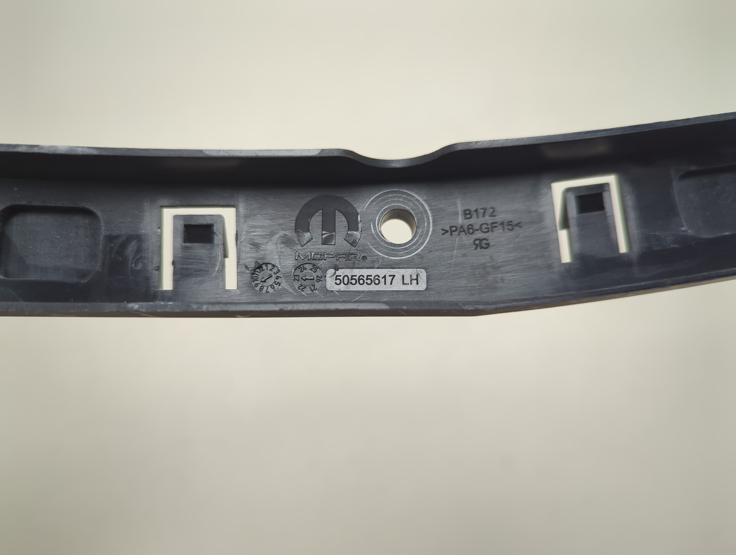 Кронштейн заднего бампера левый