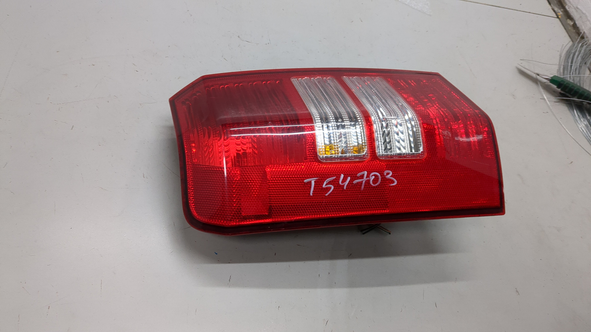 Фонарь задний левый