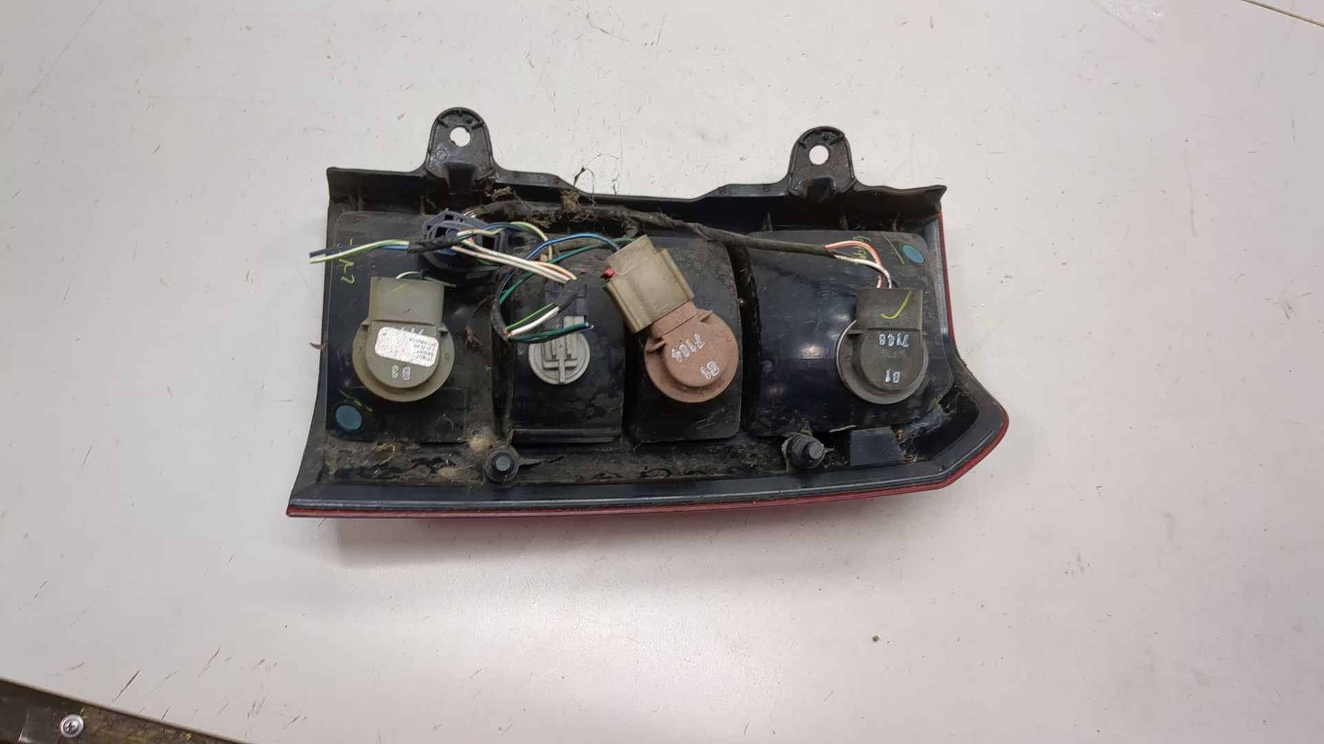 Фонарь задний левый