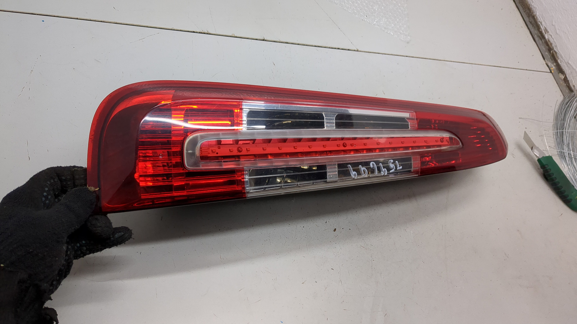 Фонарь задний левый