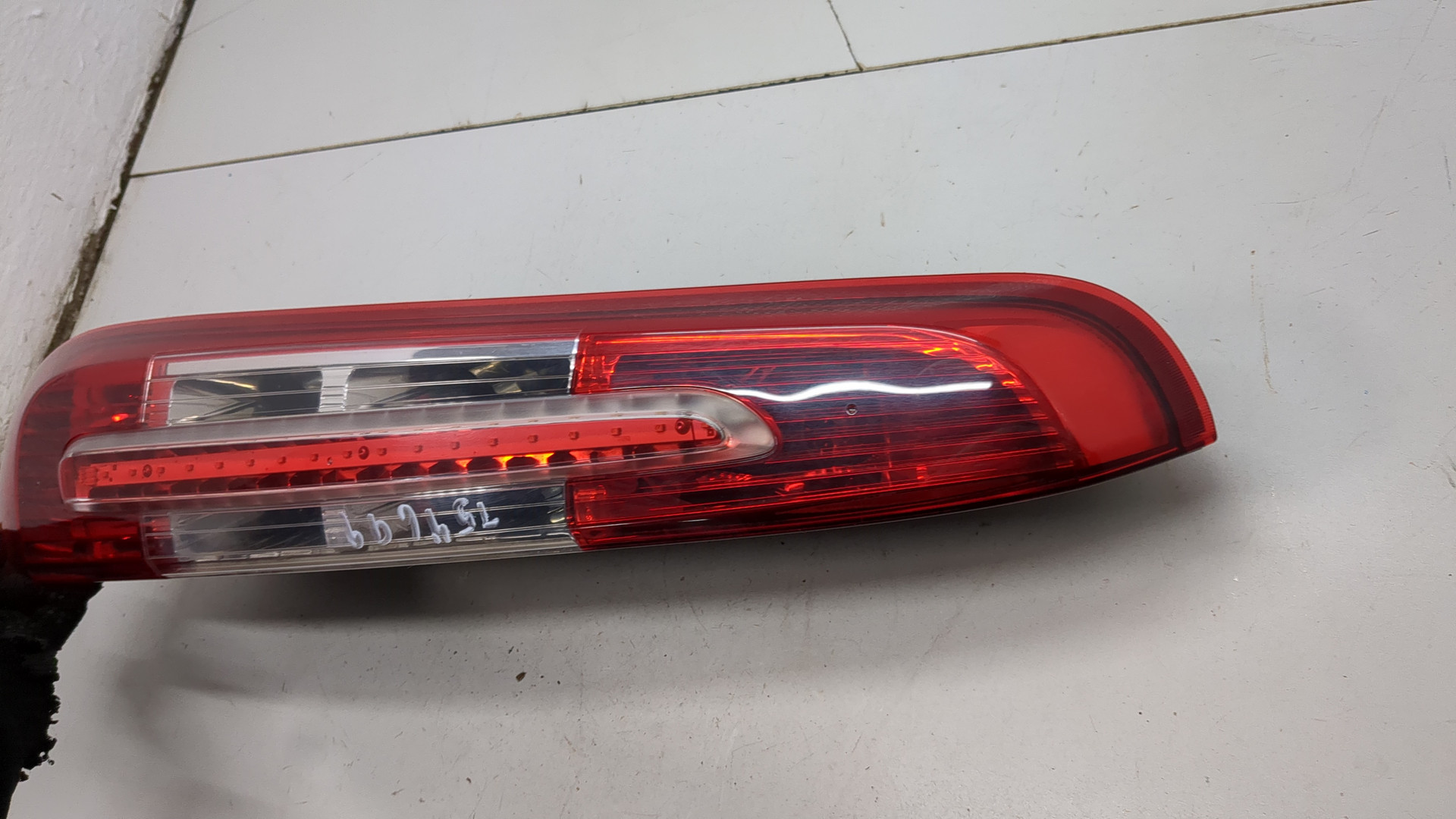 Фонарь задний левый