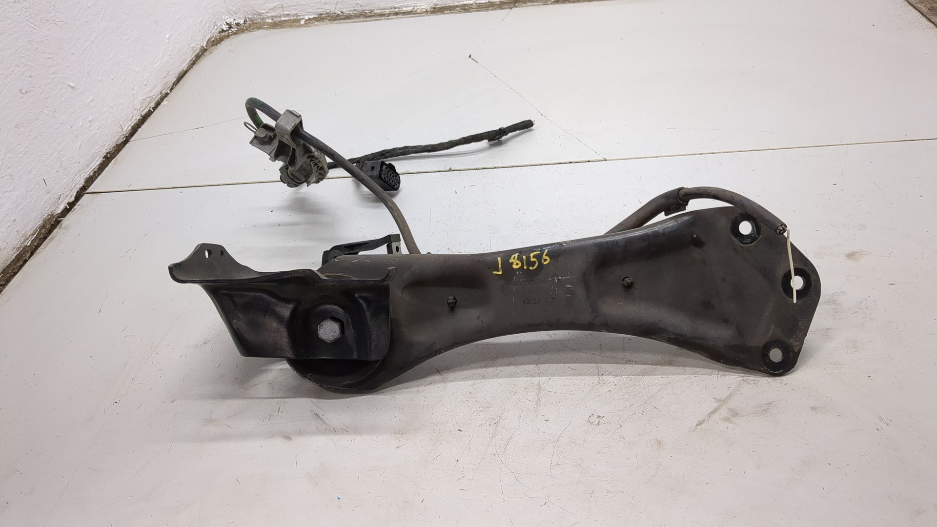 Рычаг задний левый