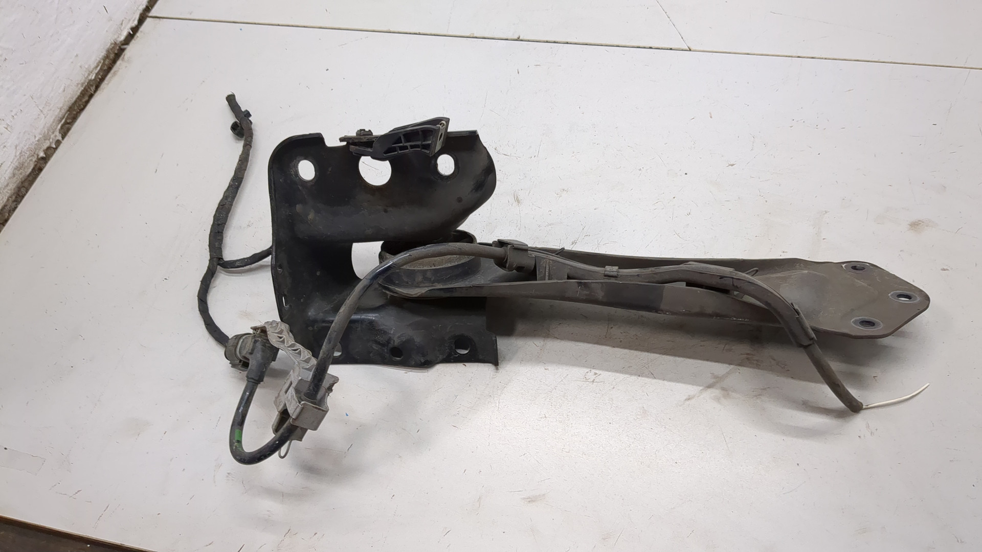 Рычаг задний левый