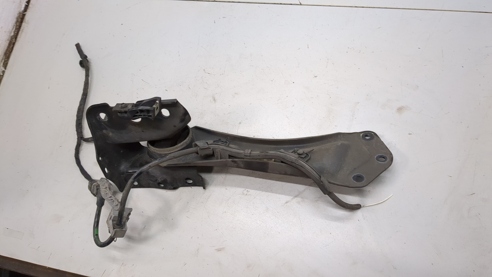 Рычаг задний левый