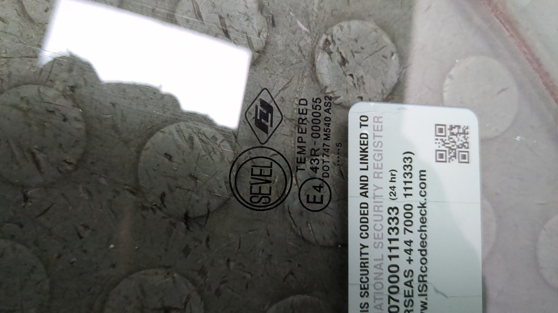 Стекло двери передней левой