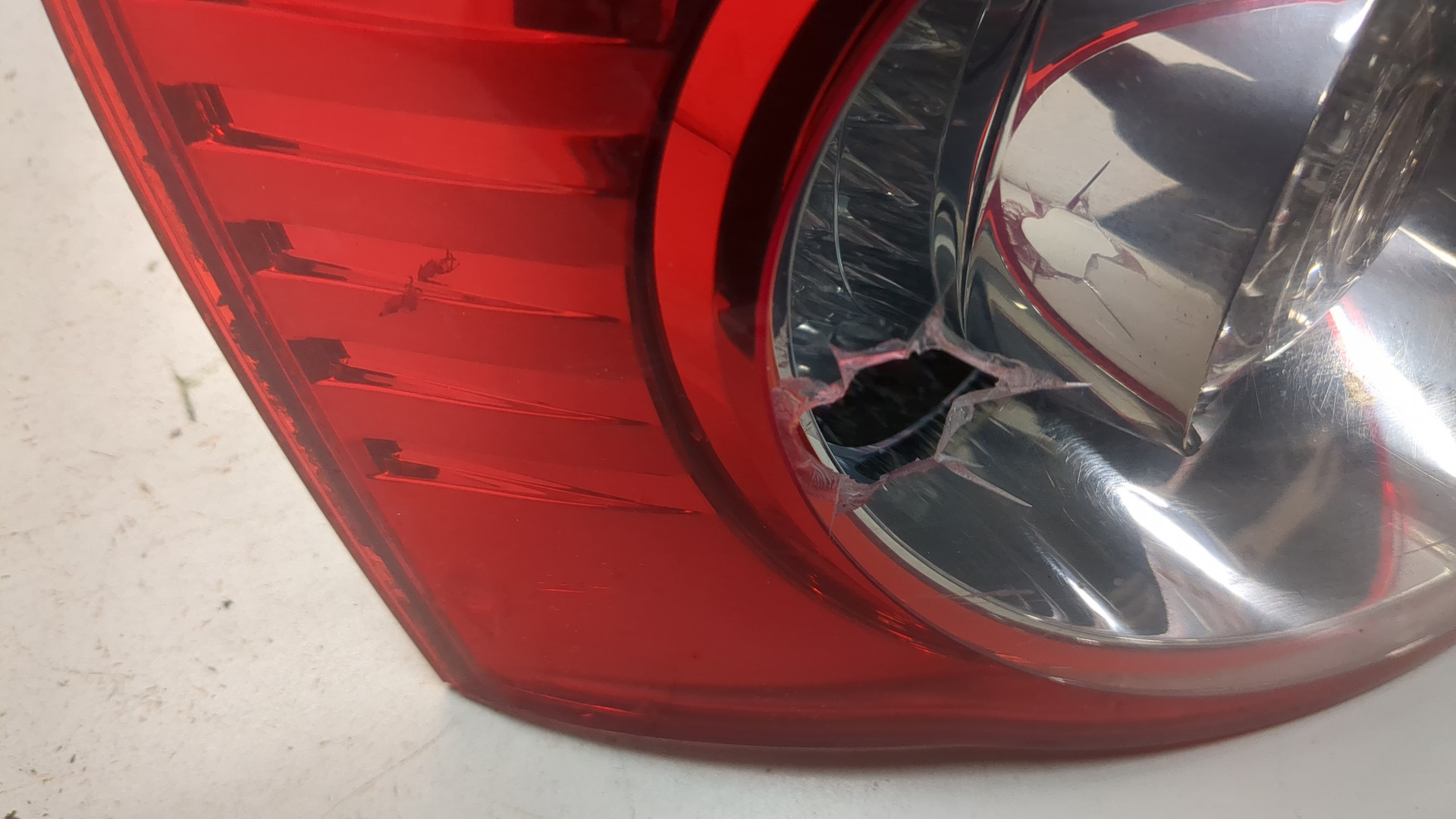 Фонарь задний левый