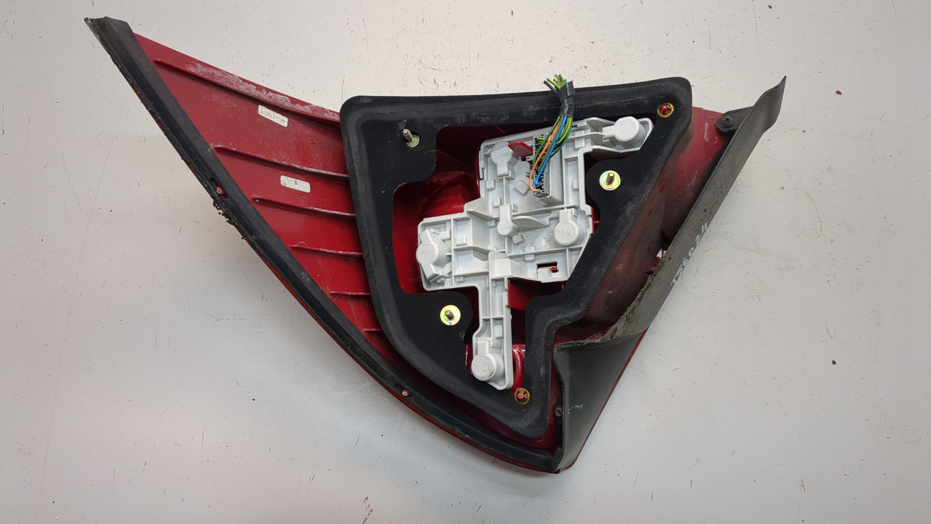 Фонарь задний левый