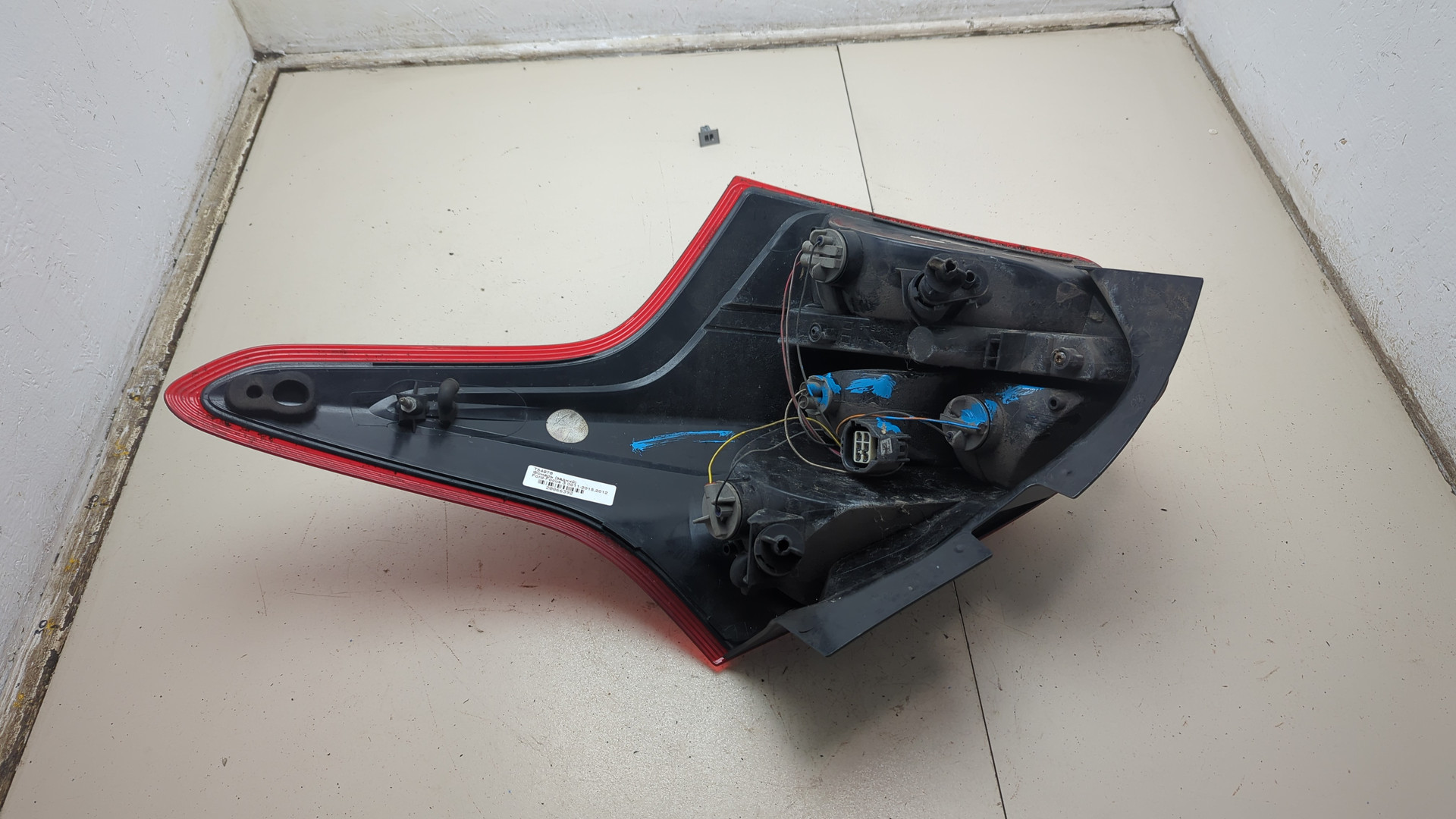 Фонарь задний левый