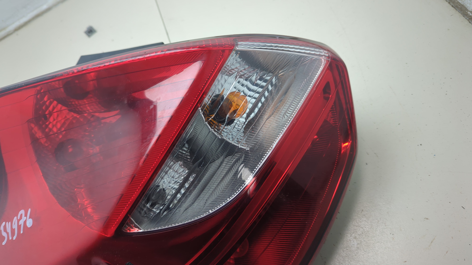 Фонарь задний левый