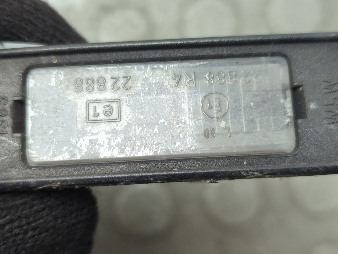 Фонарь подсветки номера