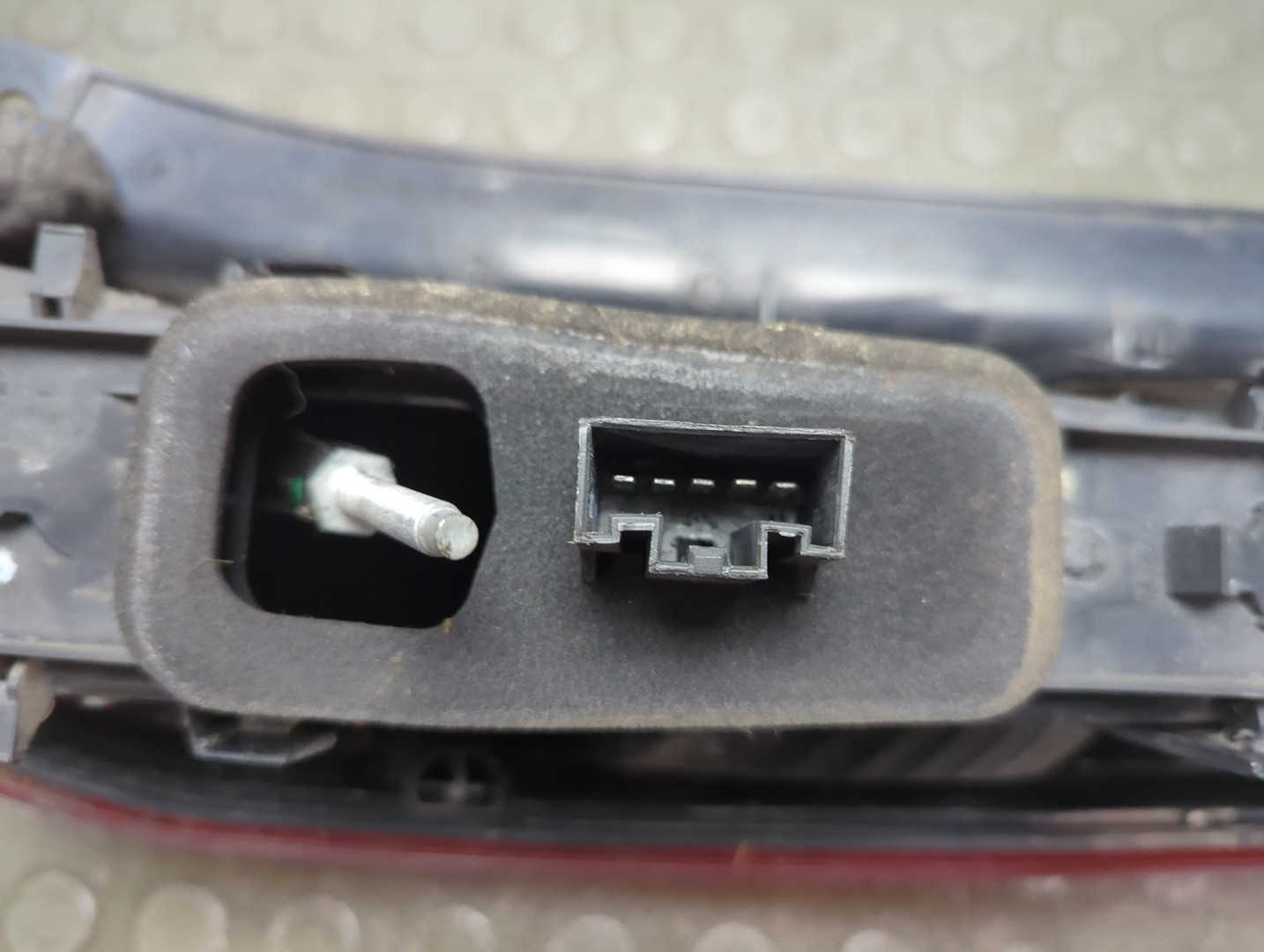 Фонарь задний левый