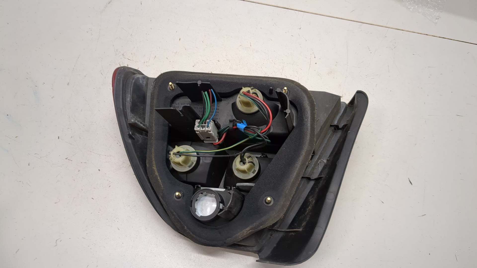 Фонарь задний левый