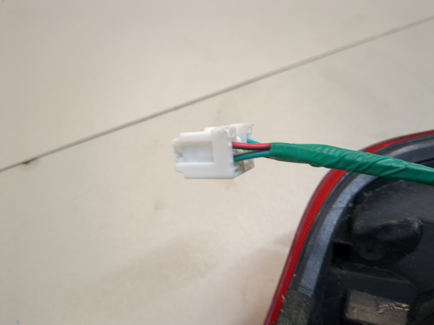 Фонарь задний левый