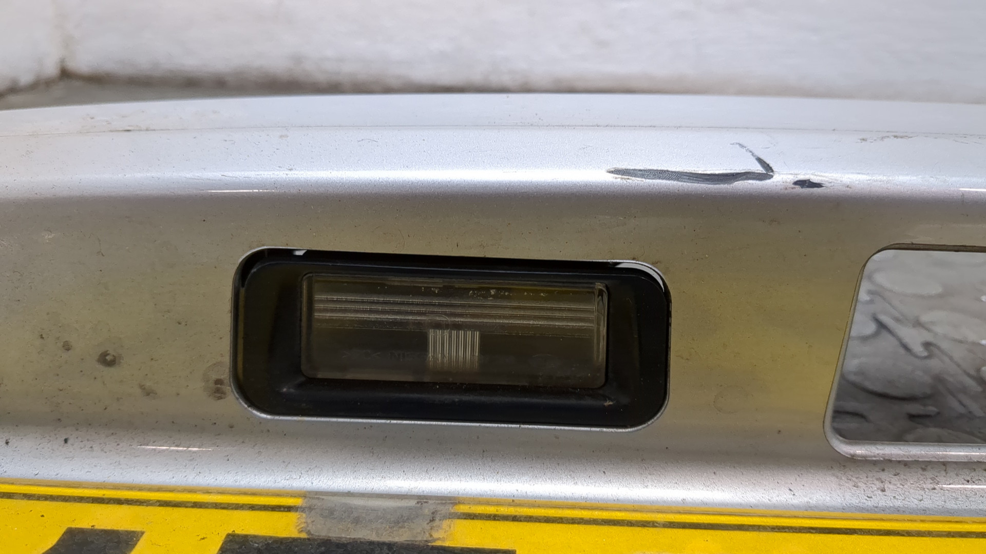 Фонарь подсветки номера