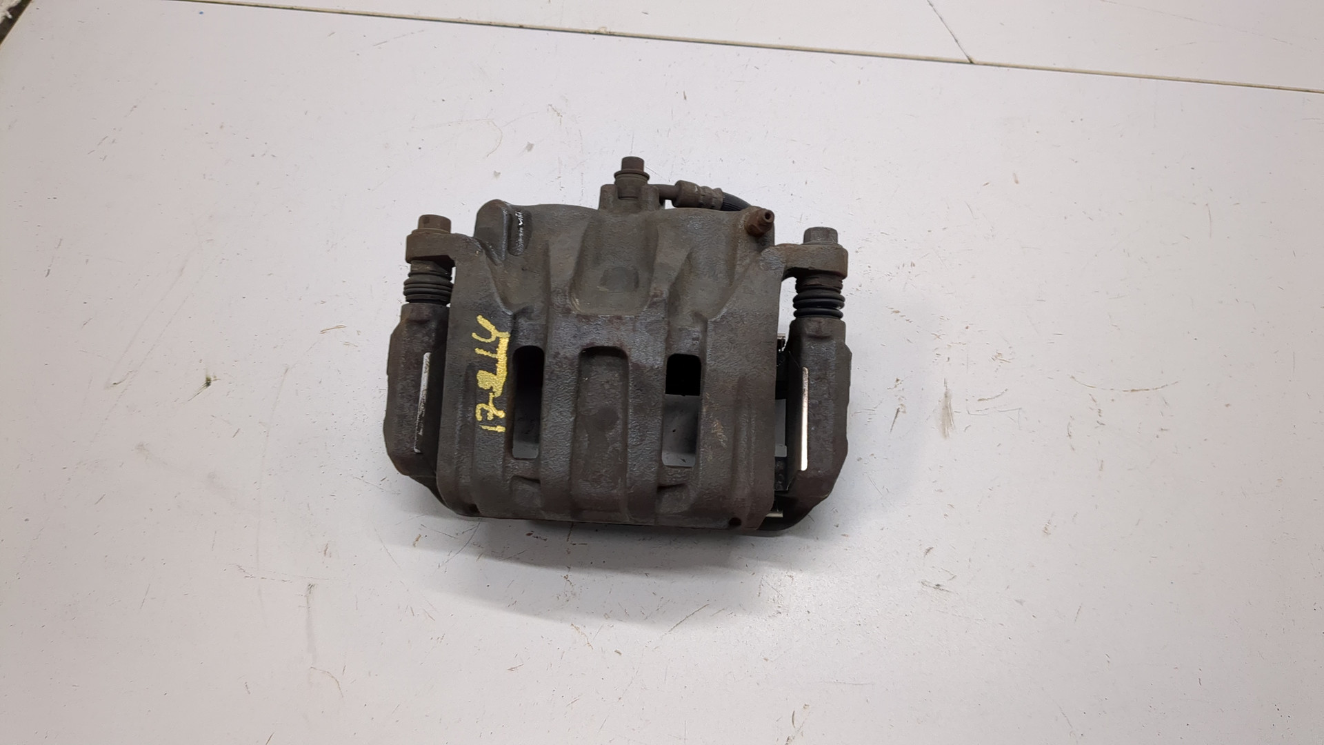 Суппорт передний левый