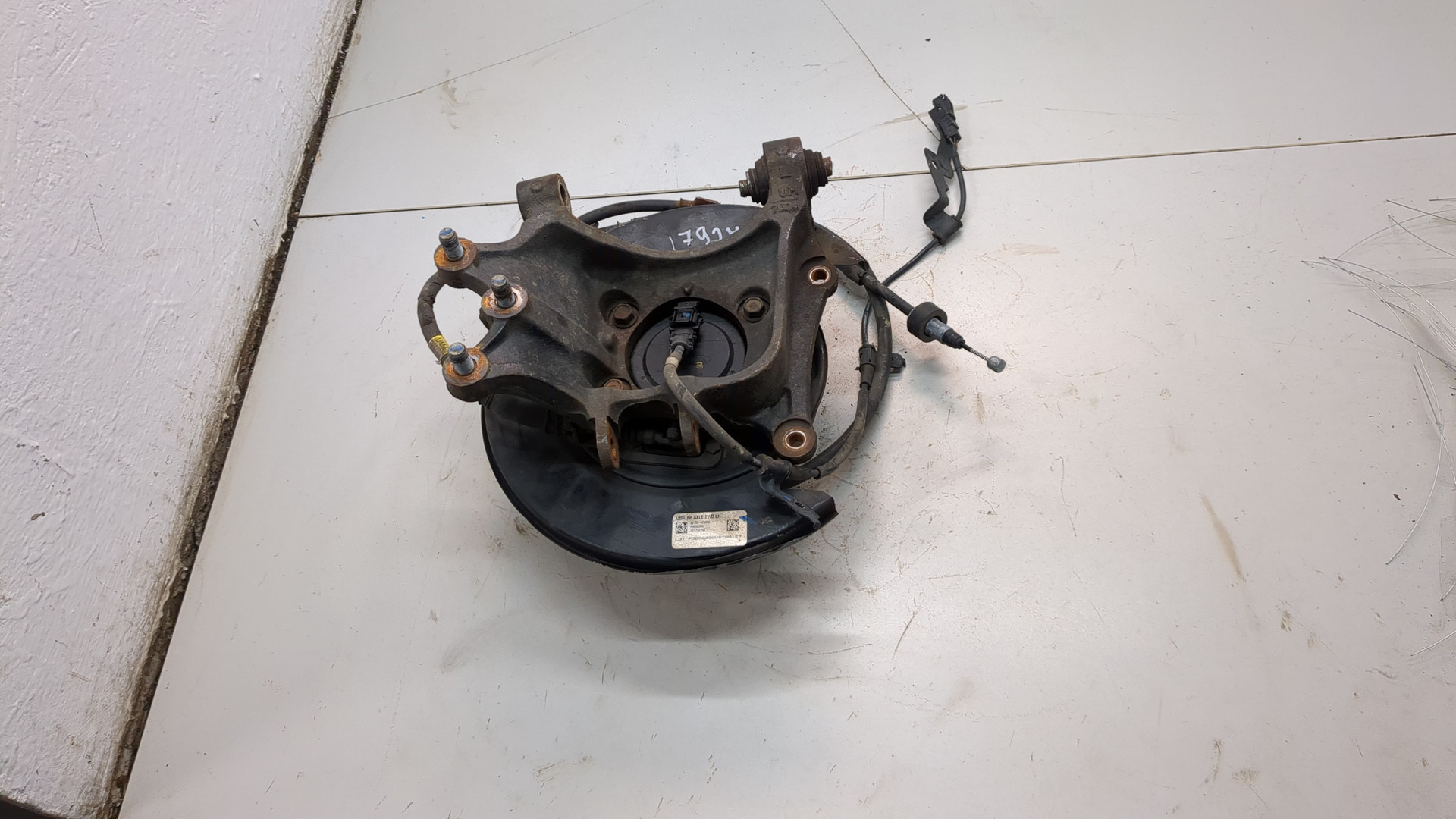 Кулак поворотный задний левый