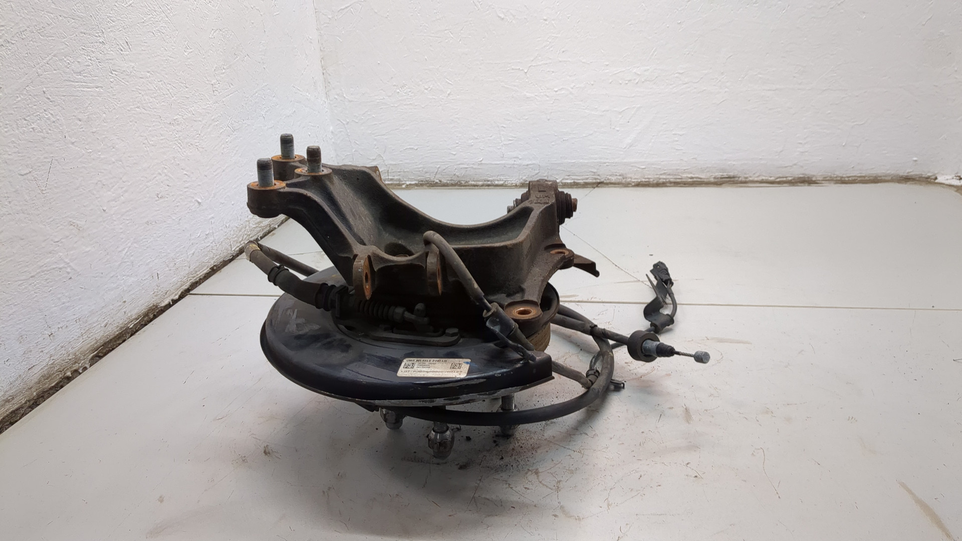 Кулак поворотный задний левый