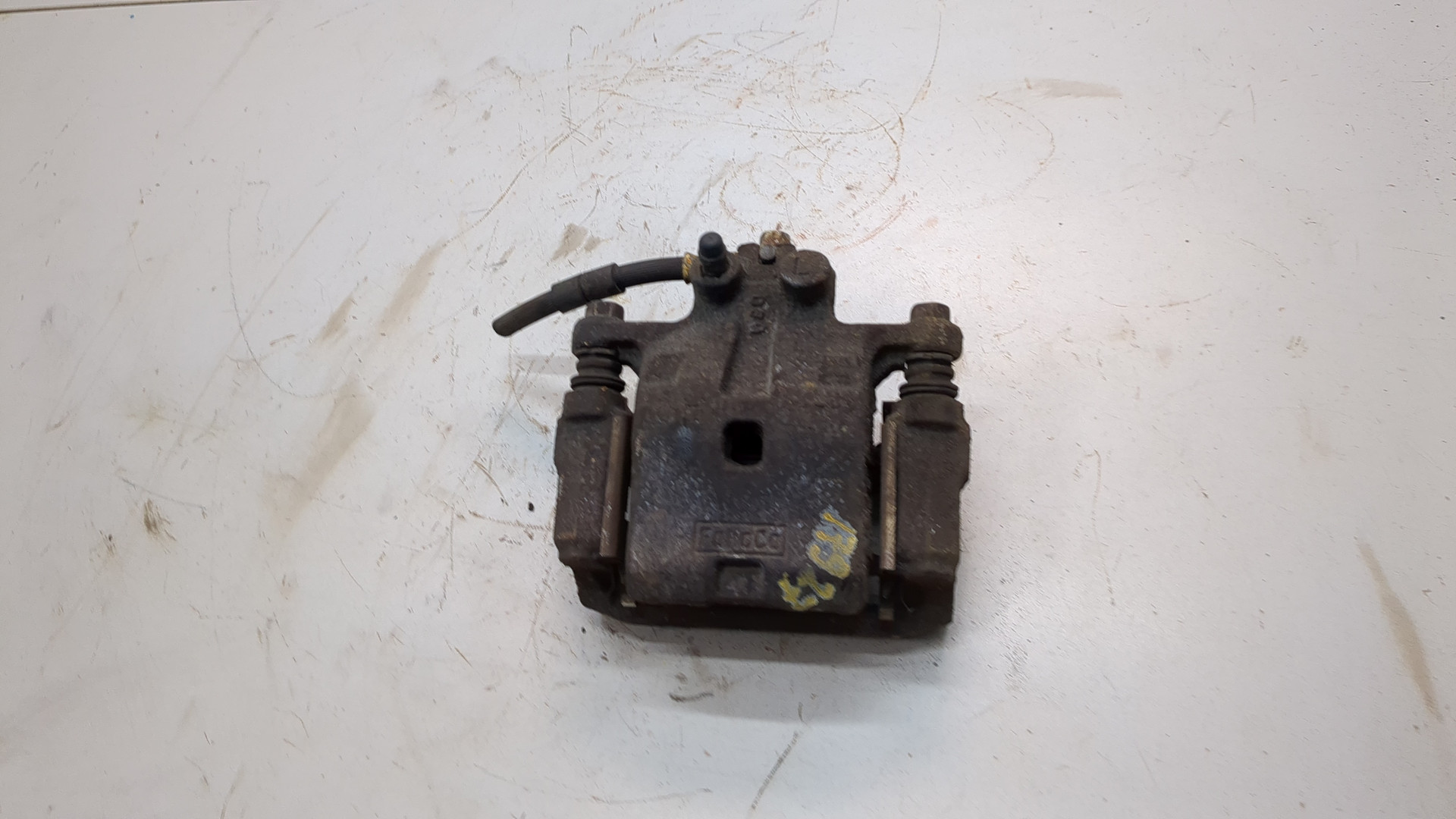 Суппорт задний левый