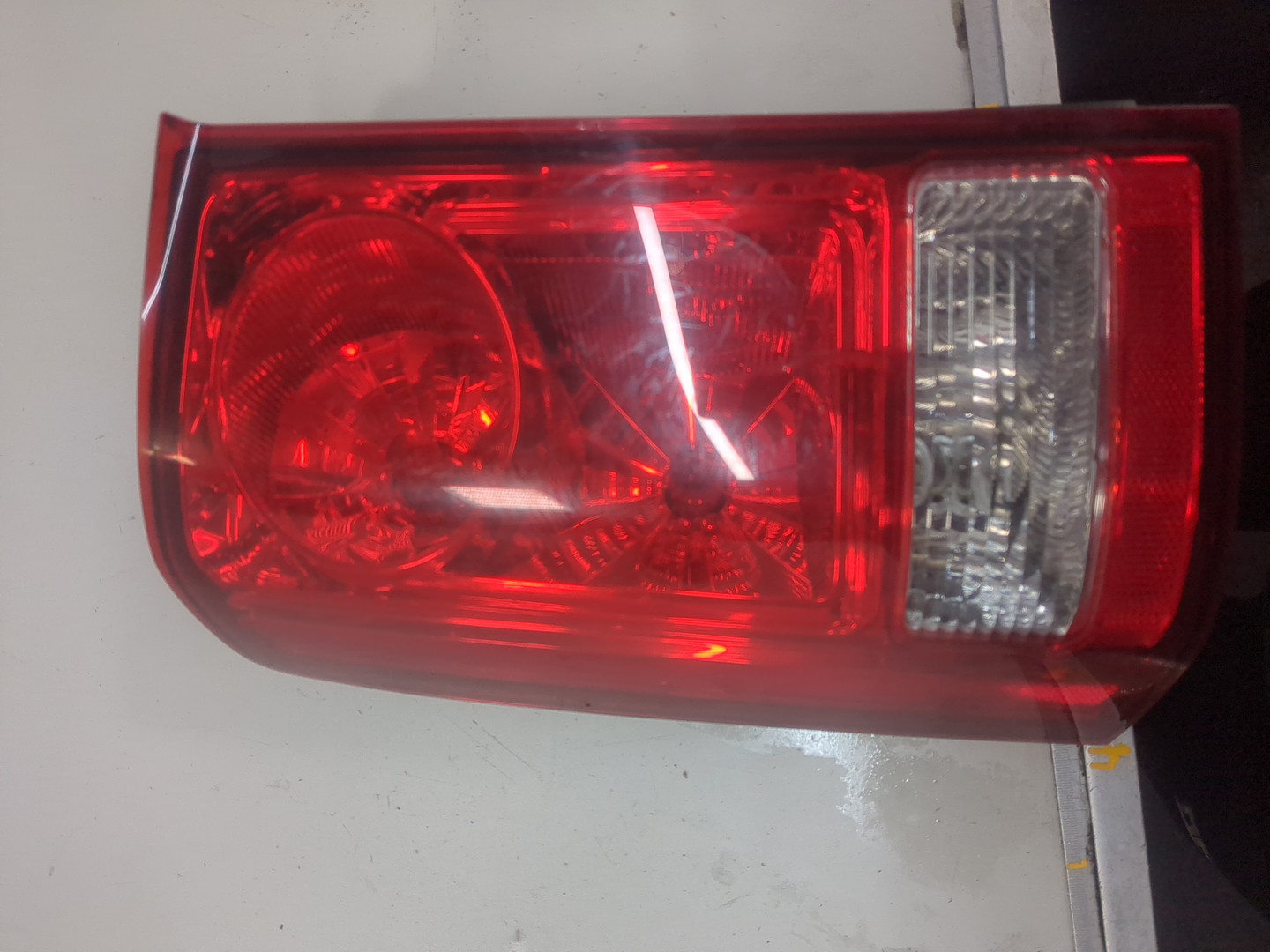 Фонарь задний левый