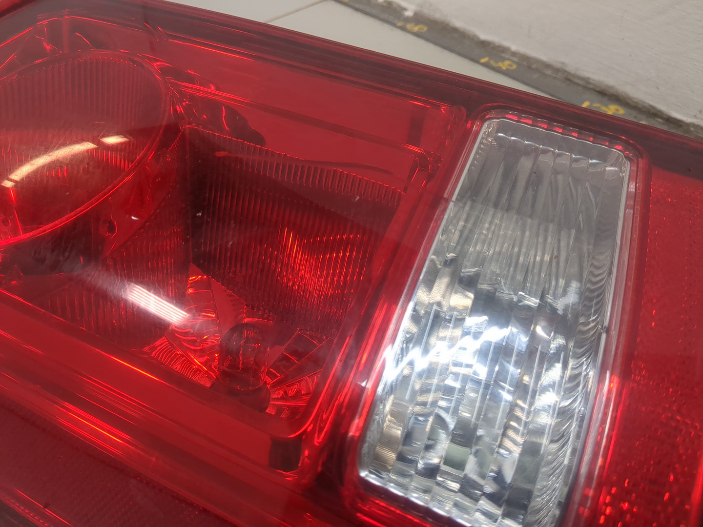 Фонарь задний левый