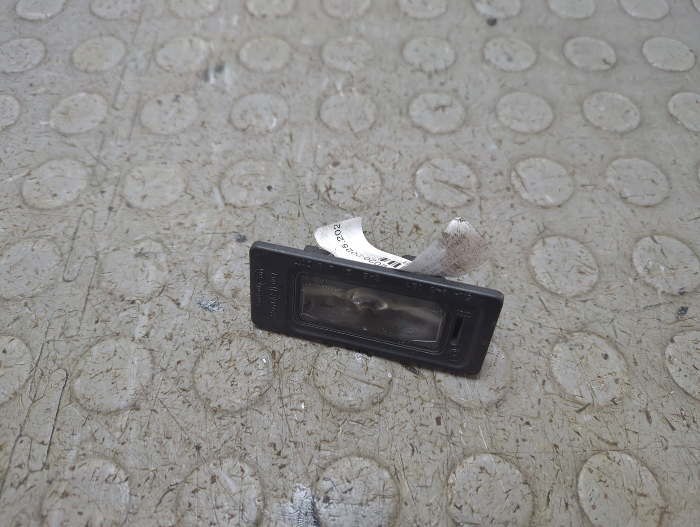 Фонарь подсветки номера