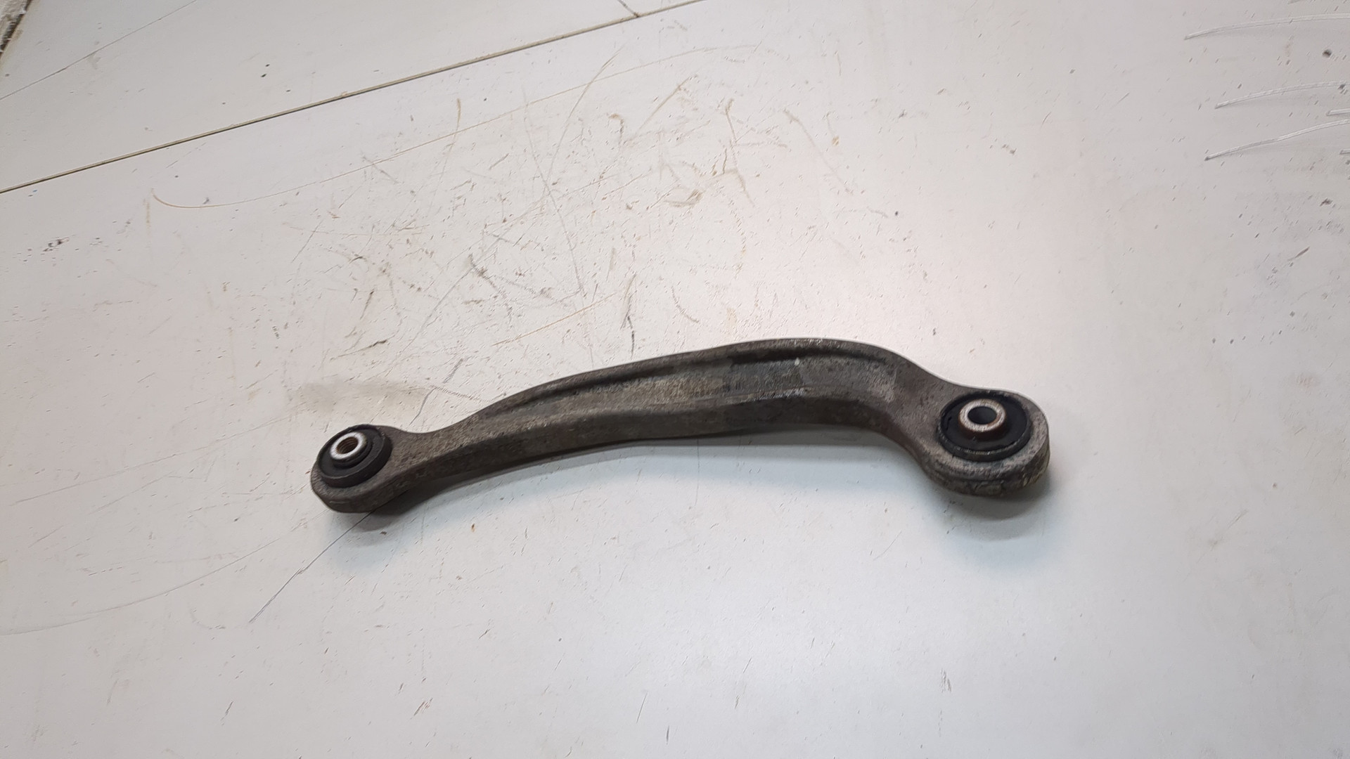 Рычаг задний левый