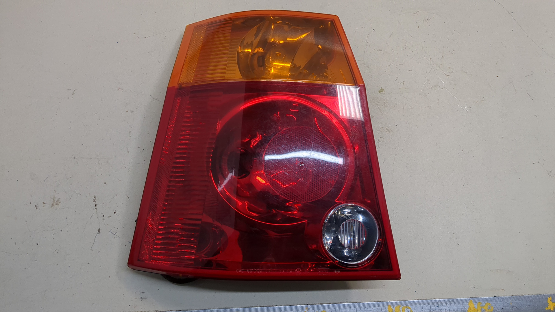 Фонарь задний левый