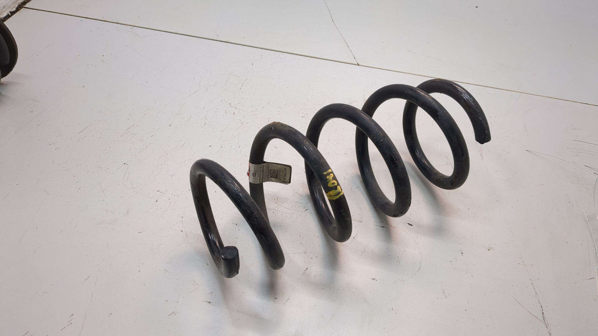 Пружина задняя