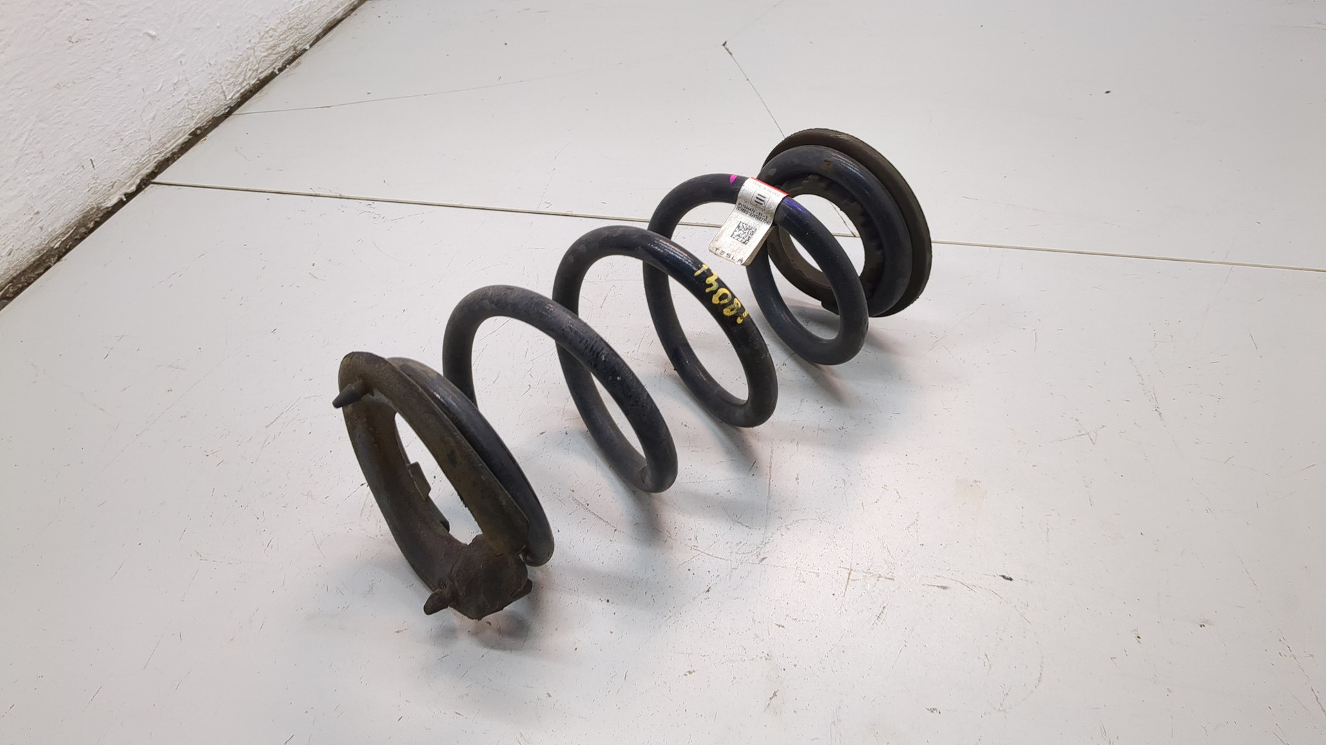 Пружина задняя