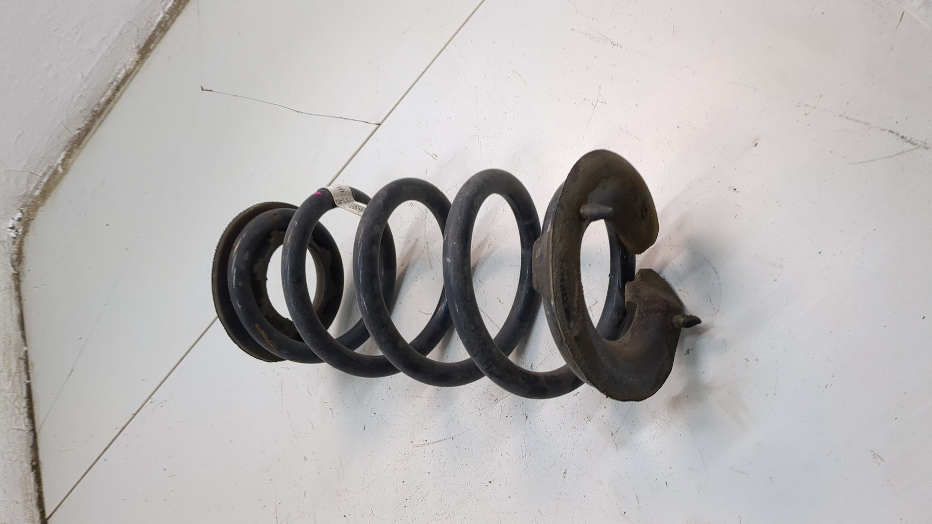 Пружина задняя