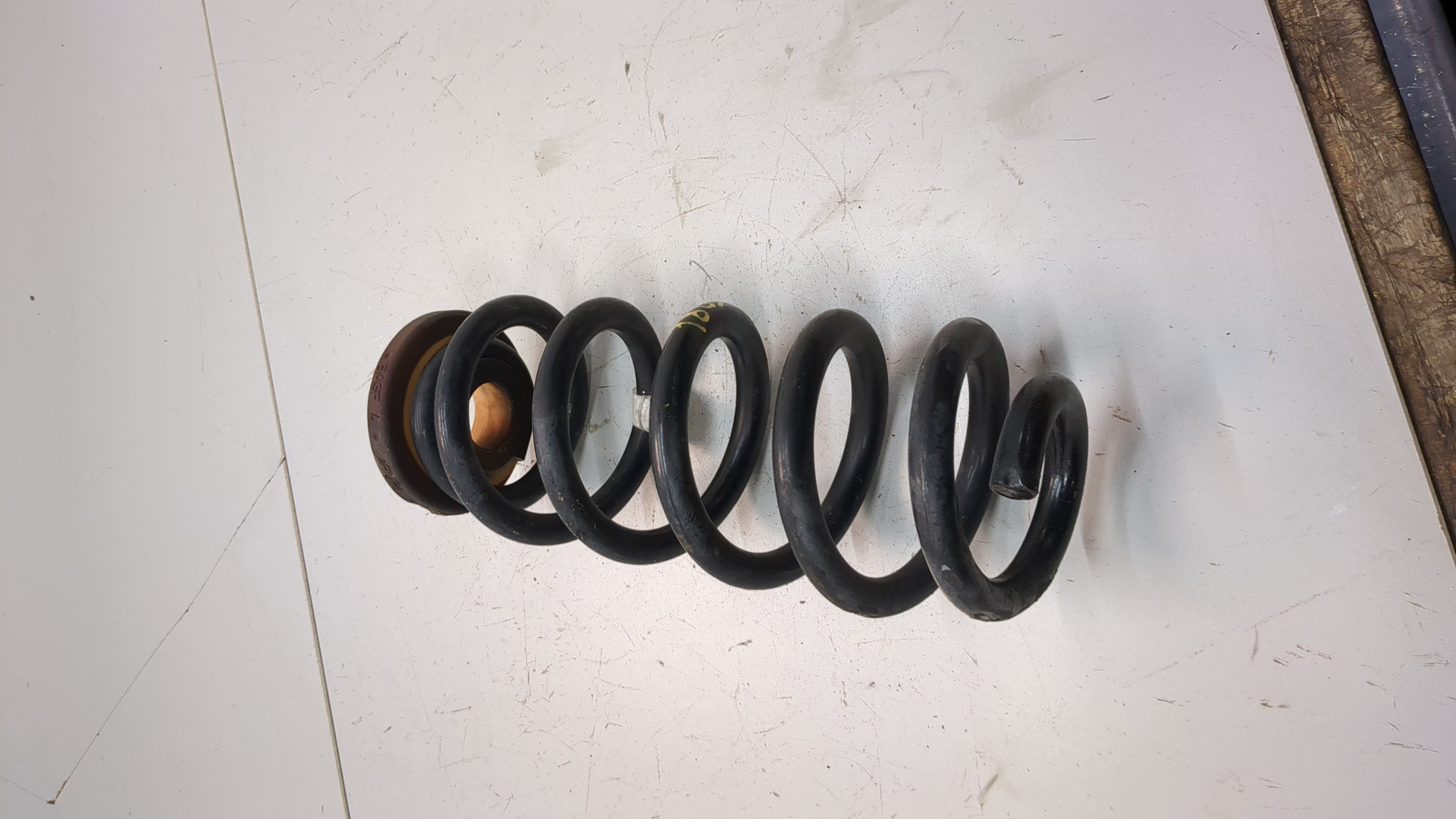 Пружина задняя