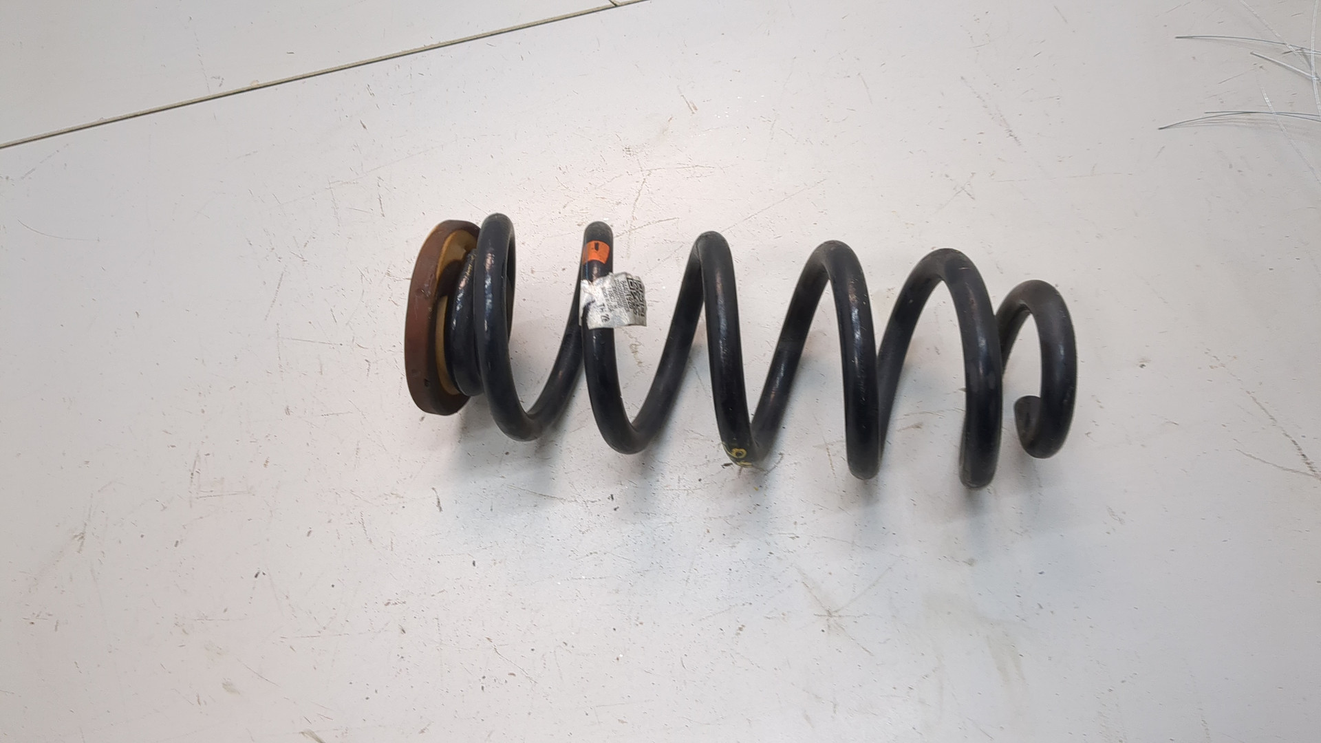 Пружина задняя