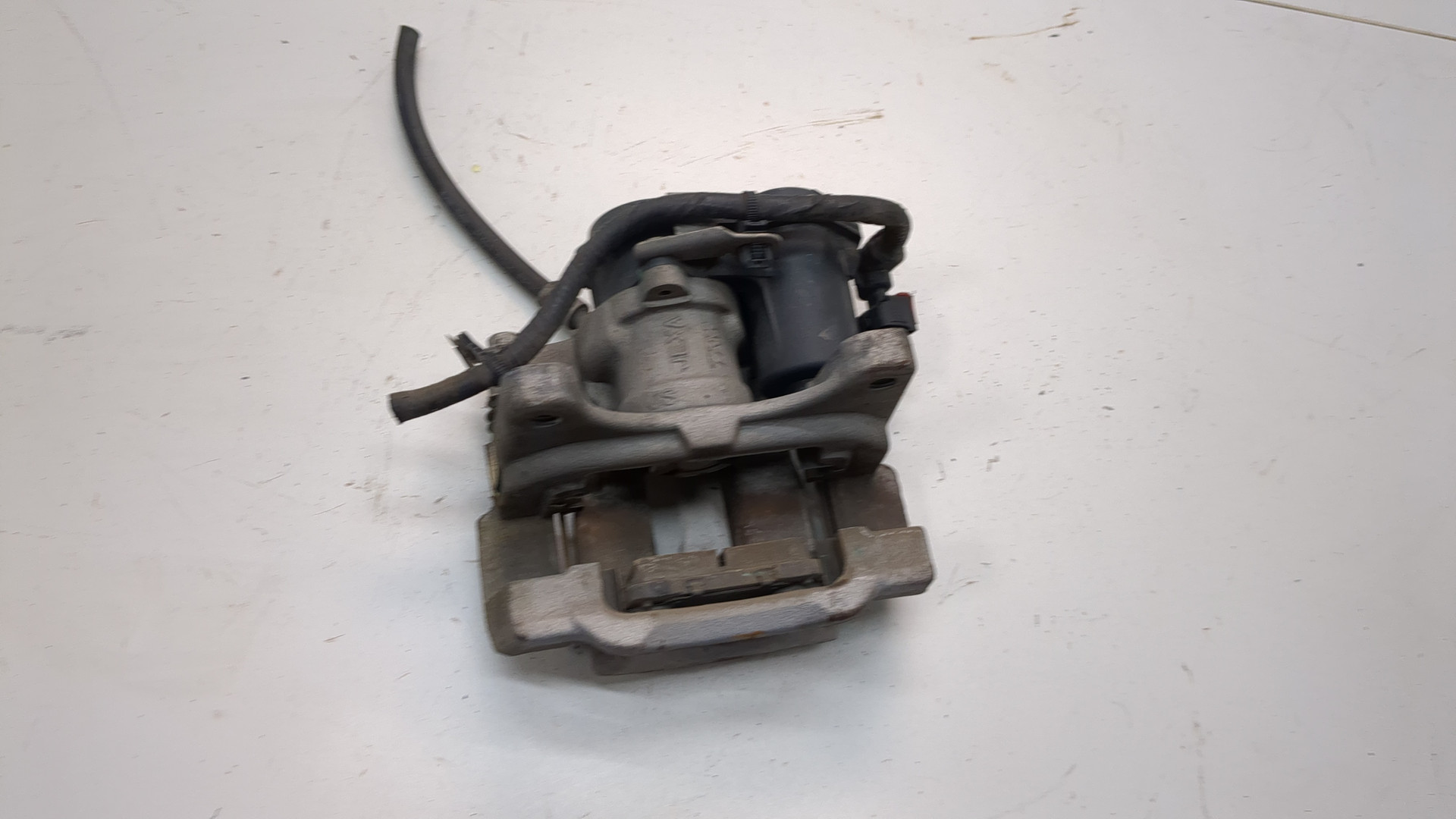 Суппорт задний левый