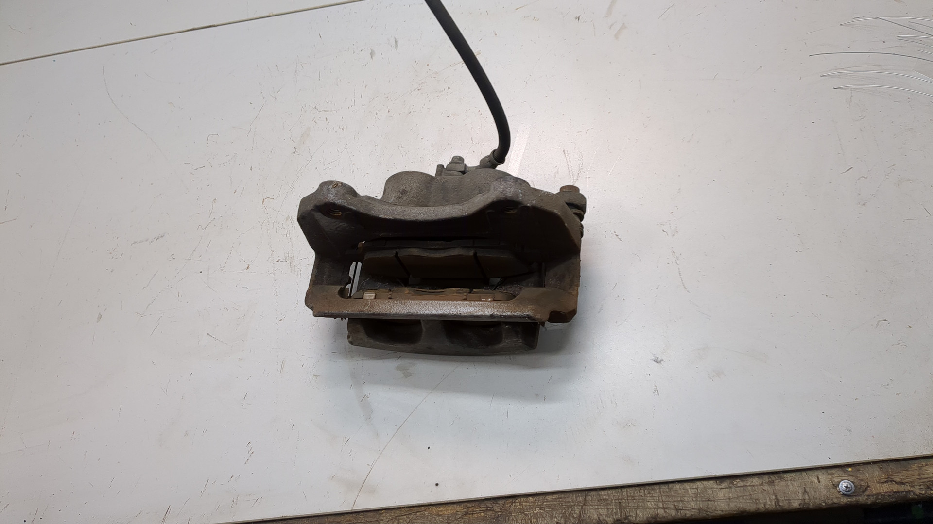 Суппорт передний левый